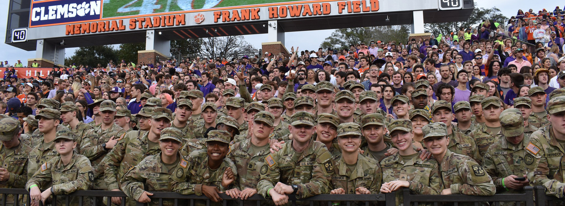 Cadets in camouflage at military appreciation day football game