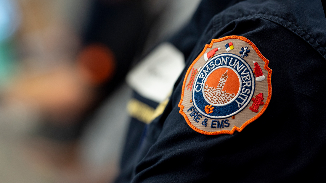 The Clemson University Fire and EMS patch shown on the sleeve of a firefighter's uniform.