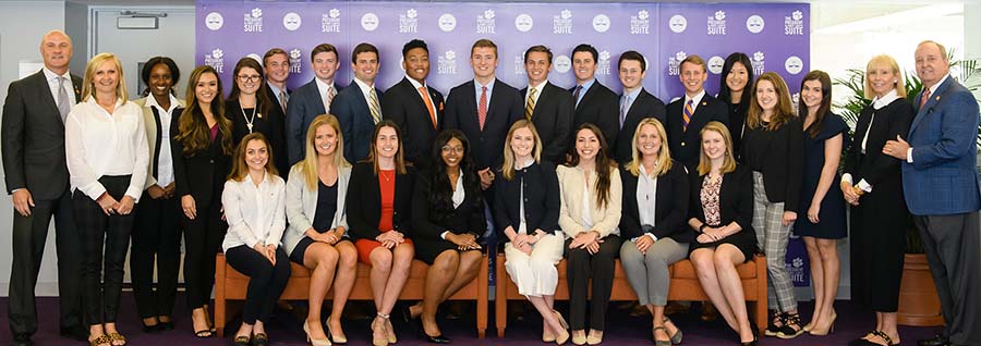 Chapman Leadership Scholars posing with President Clements
