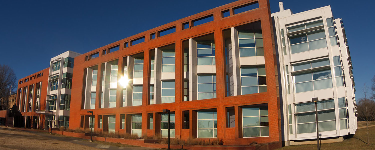 Brick Life Sciences Facility building on Clemson campus, with sunset reflection.