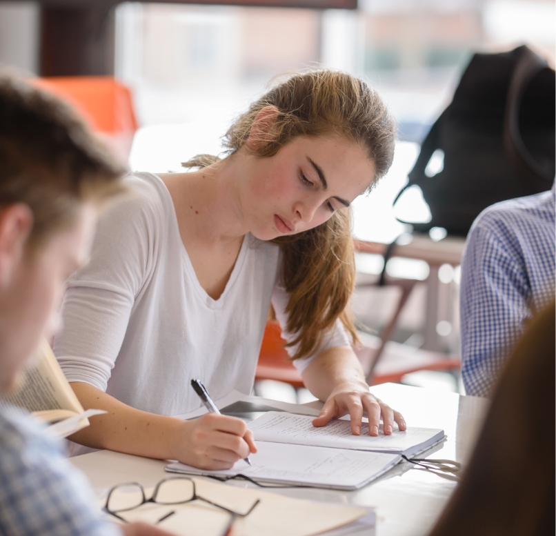 Louise Franke studies with a group in class.