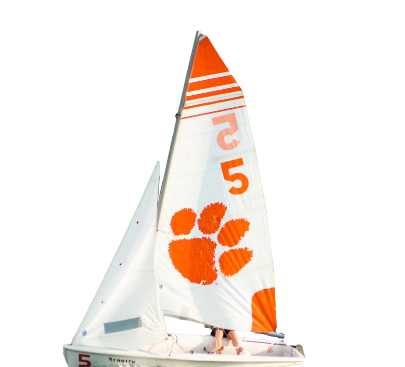 A sail boat with the clemson logo on it.