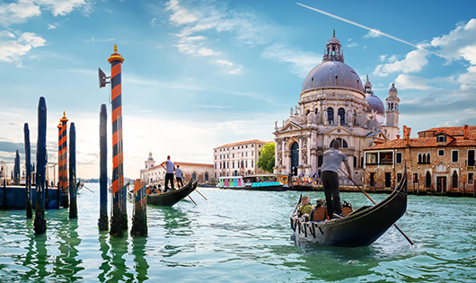 Boat on river in Venice Italy.