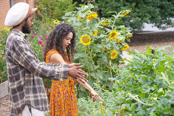 students in the Clemson community garden