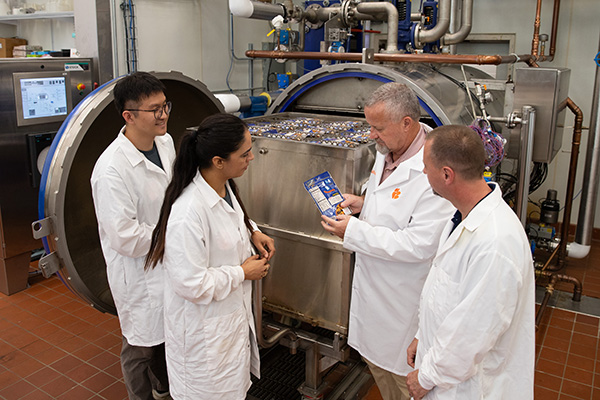 students looking at a food packaging