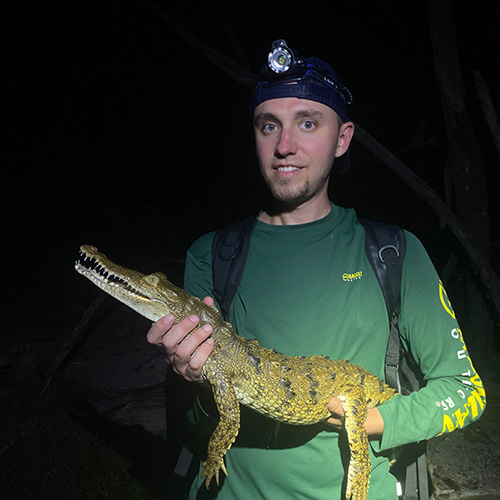 Bobby Greco holding a baby alligator