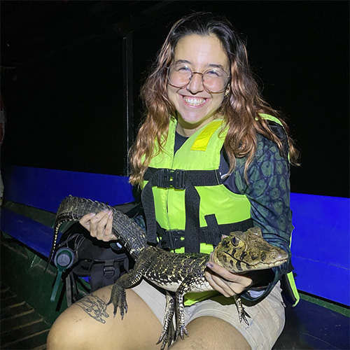 Hallie holding a small alligator