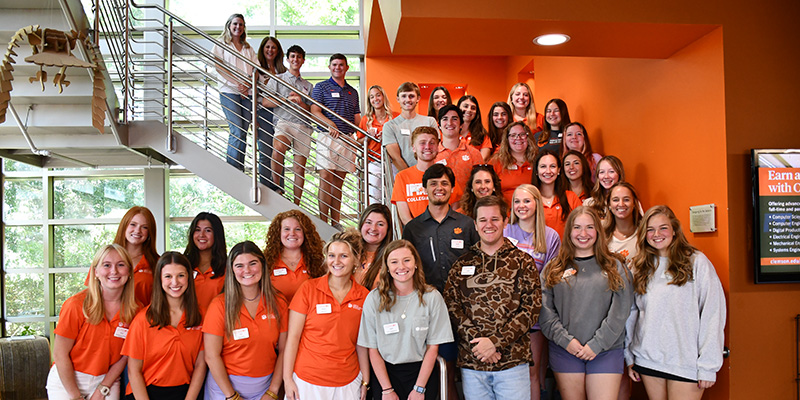 cafls ambassadors posing on a staircase