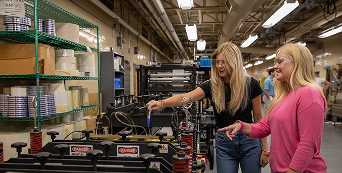 students doing experiential learning at a lab