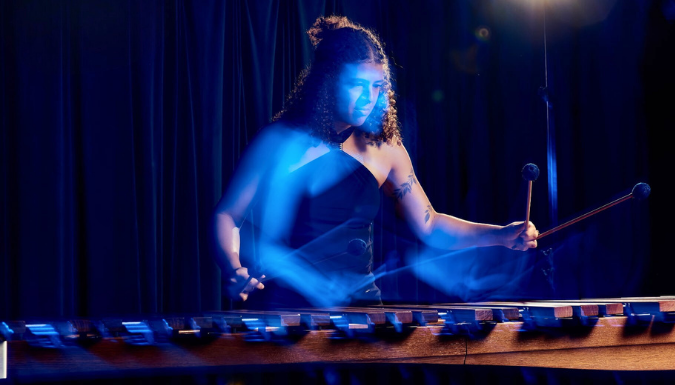 Briana Parcell plays the marimba onstage