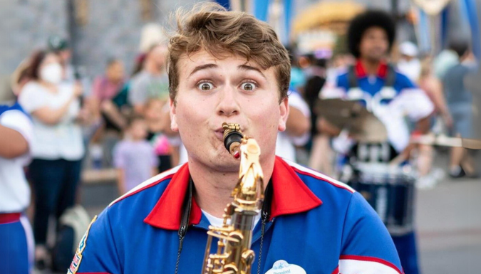 Charlie Brooks-Knepfle playing saxophone in the Disney All-American College Band