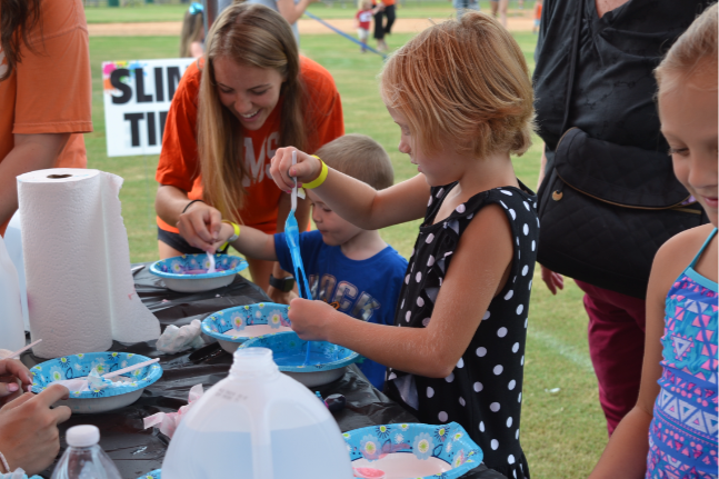 Children at a table making crafts