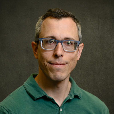 Headshot of AI & ML Director, Carl Ehrett.