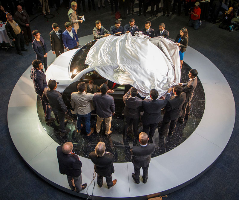 Deep Orange students unveiling a concept vehicle at an official unveiling ceremony