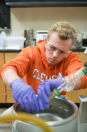 Male student during Eureka summer program in lab