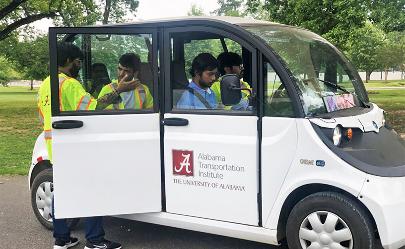 Students in vehicle demo setup