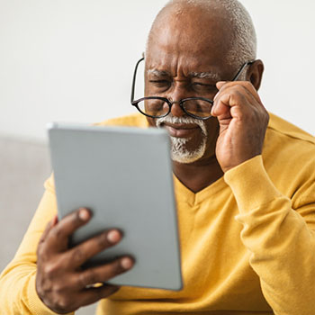 Man reading an iPad