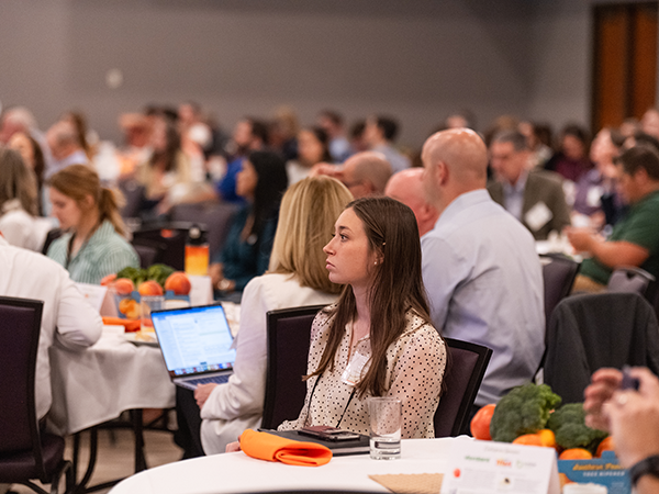 people sitting down for the summit event