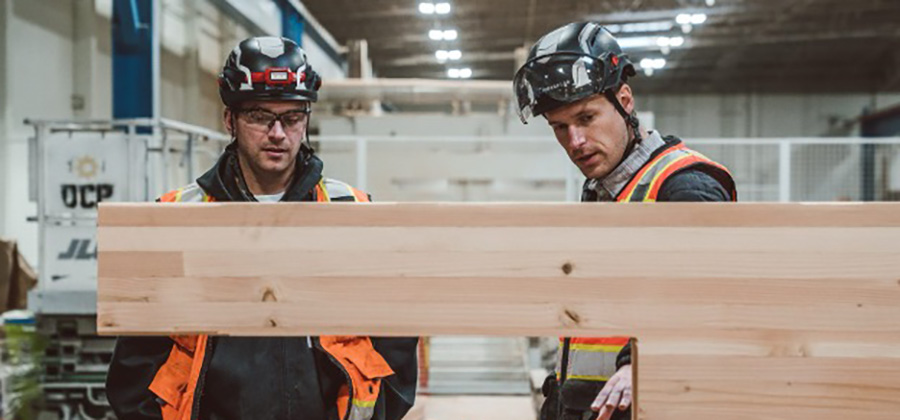 two students working on wood