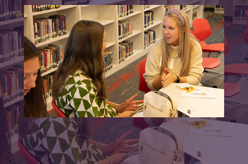 Kirstin Bull (right) meets Ellison Pruitt for the first time at Teacher Residency Match Day.