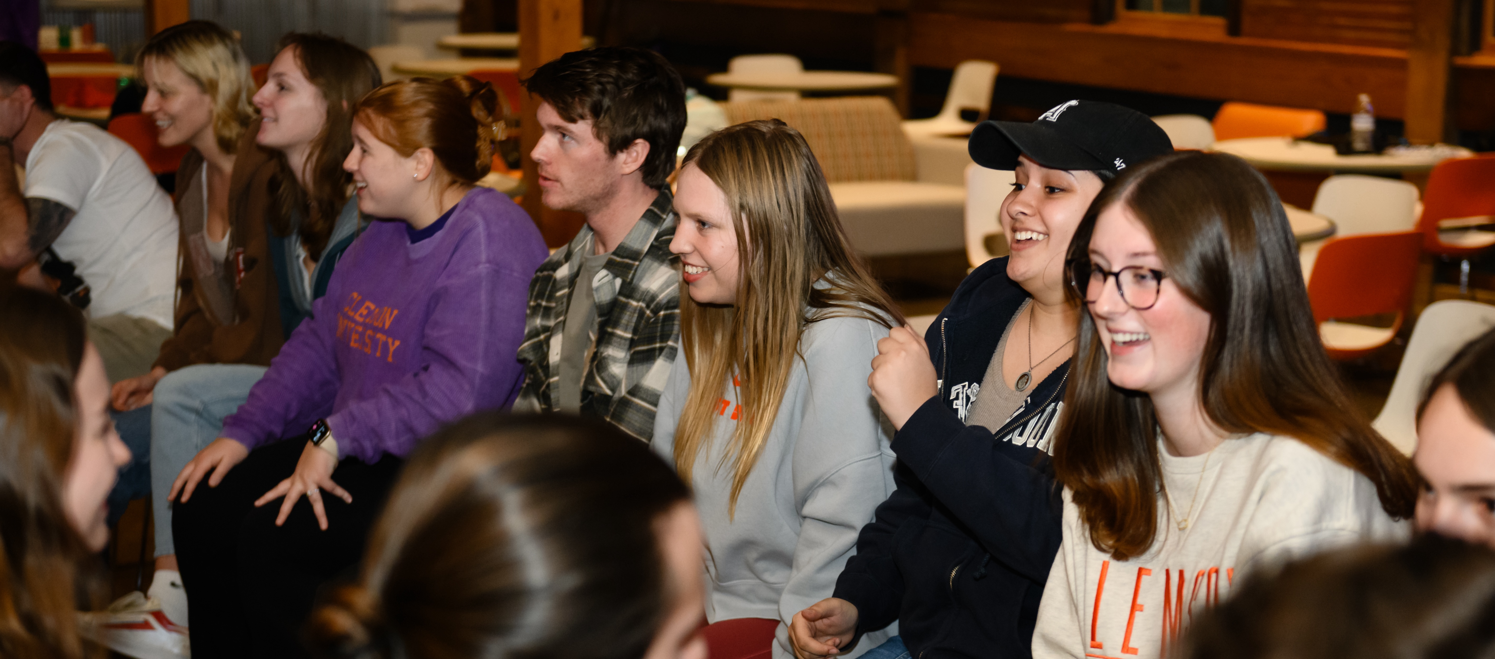 College students in rows smiling