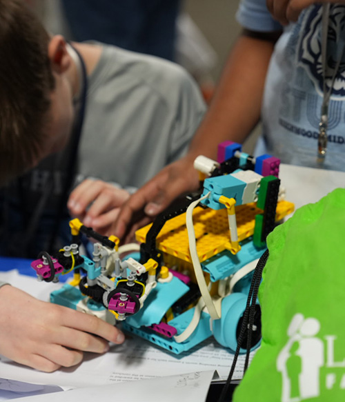 kids working on their lego robots