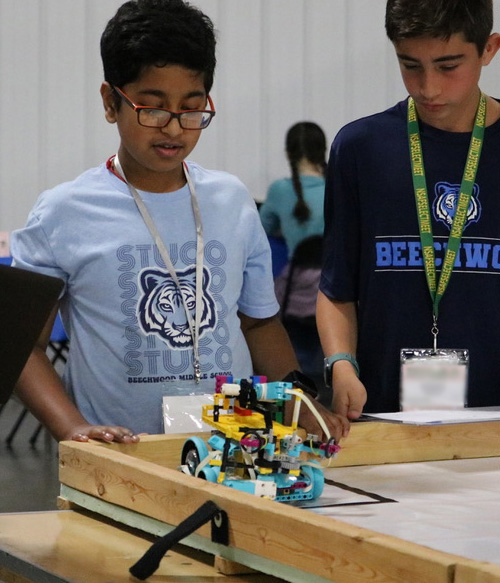 kids working on their lego robots