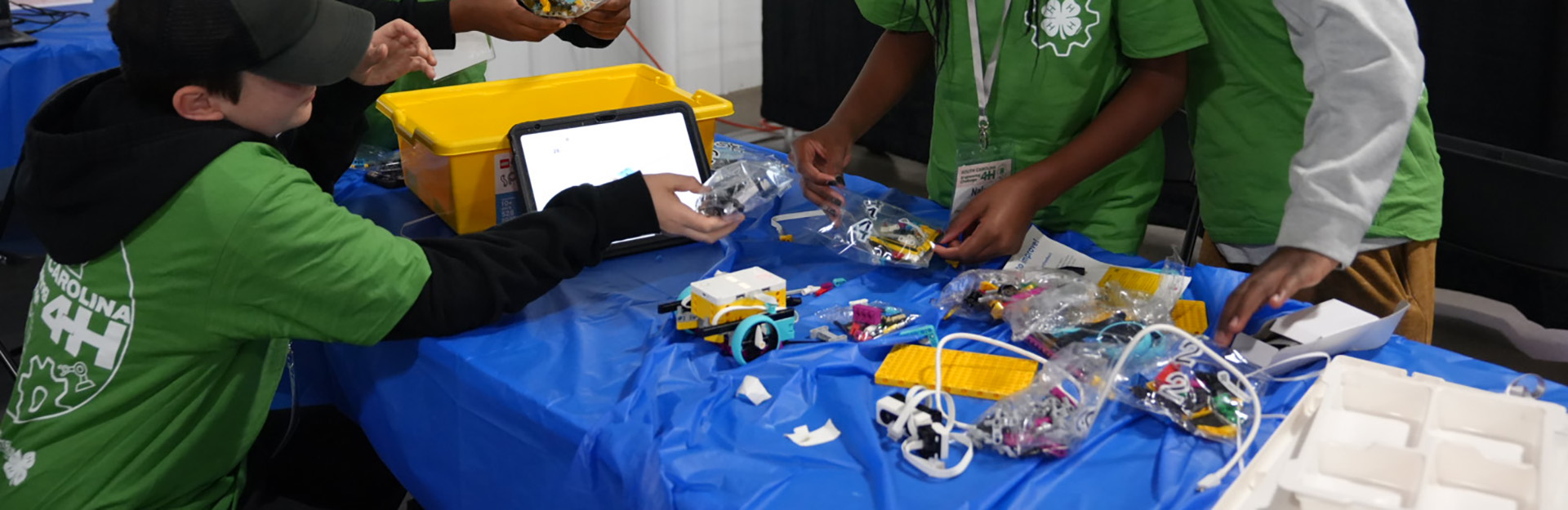 kids working on their lego robots