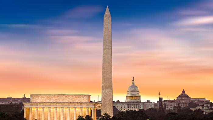 A wide angle photograph of monuments in Washington DC.