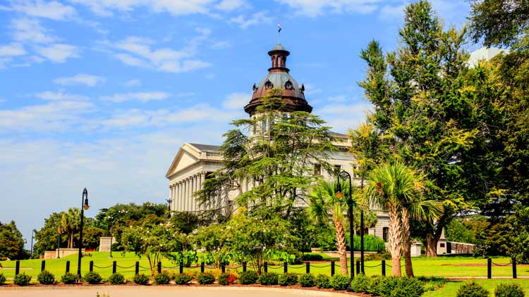 The South Carolina state house grounds with the capitol building in the background.