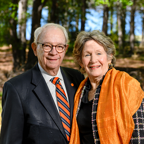 The Turners pose smiling together outside