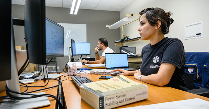 Students sitting at computer workstations