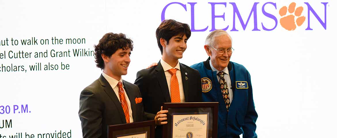 Robyn Curtis, Grant Wilkins, Astronaut Charles Duke, and Gabe Cutter posing at the University's Astronaut Scholarship celebration in spring 2023. 