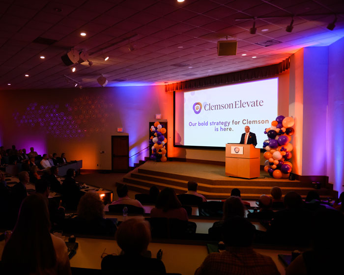 Clemson president James Clements at a podium during the Clemson Elevate plan announcement