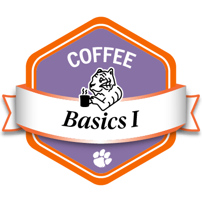 Sample light purple COFFEE Basics 1 badge featuring a tiger drinking coffee.