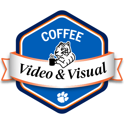 Line drawing of a tiger holding a steaming hot cup of coffee.