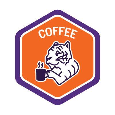 Sample orange COFFEE badge featuring a tiger drinking coffee.