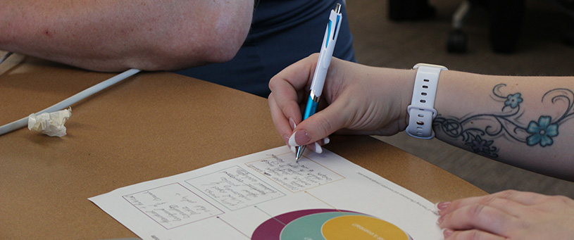 otei member working on an assignment