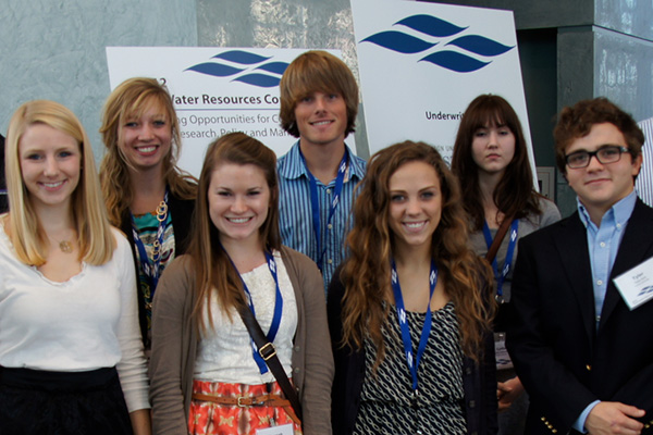 students taking a picture at the conference