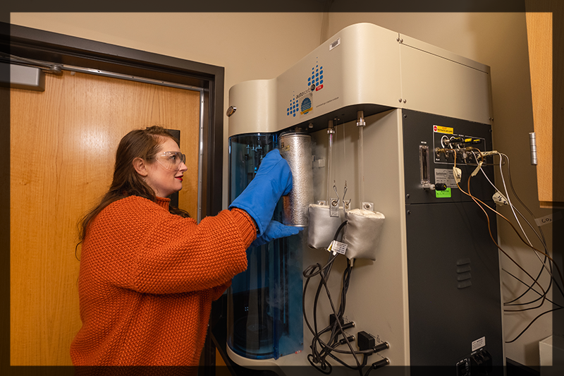 researcher with the equipment