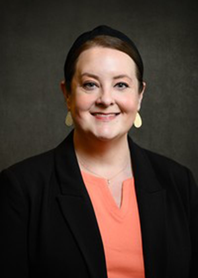 Headshot of woman, Meredith Williams.