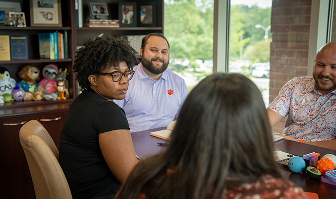 Advocacy and Success staff members during a meeting