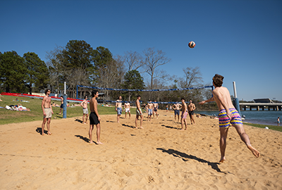 Students playing Beach Volleyball Snow Family Outdoor Activities and Wellness Center