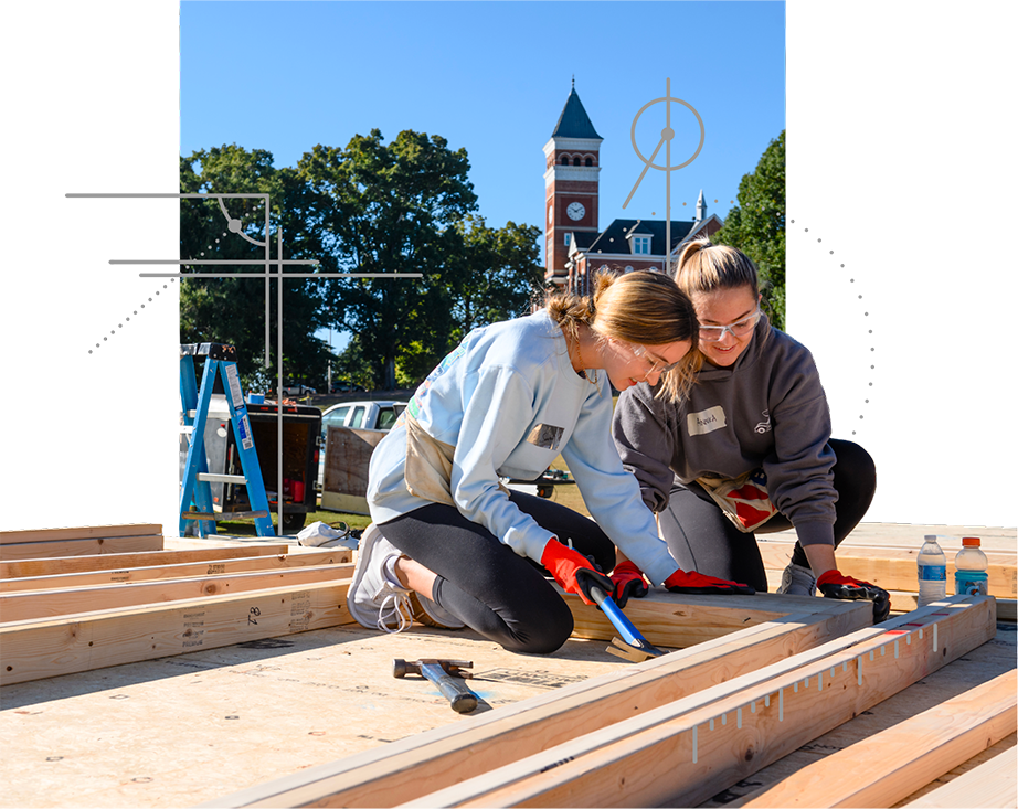 Student building Homes for Habitat at Tigerama a Clemson Homecoming Tradition