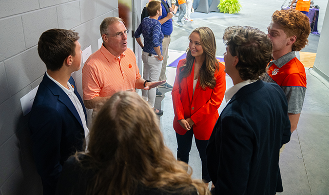 Doug Hallenbeck with Clemson students