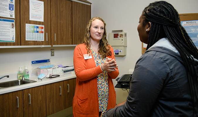 Clemson Staff helping out a student