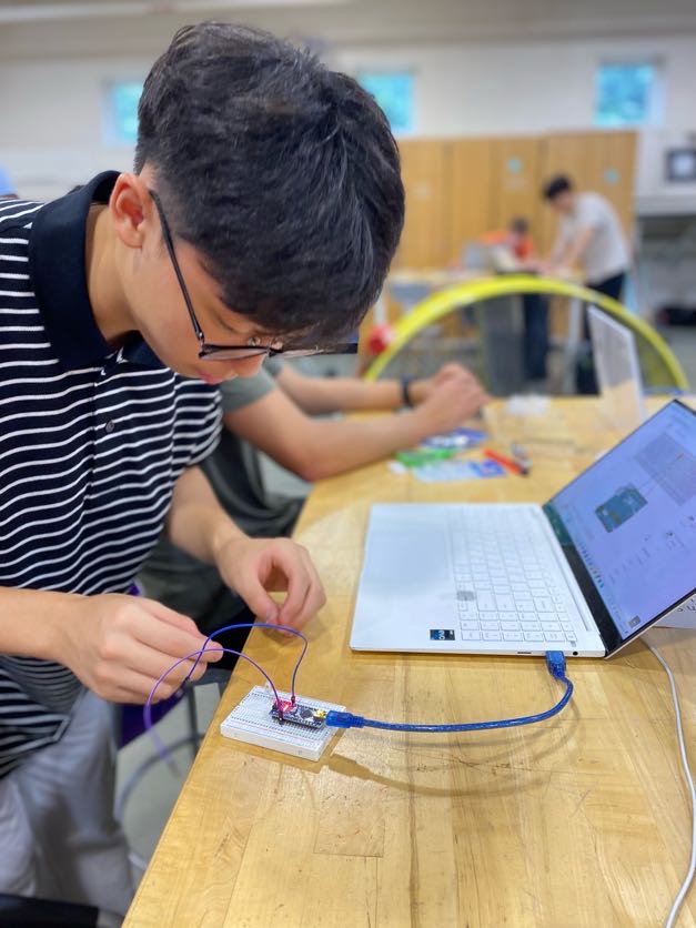 Student working on wires