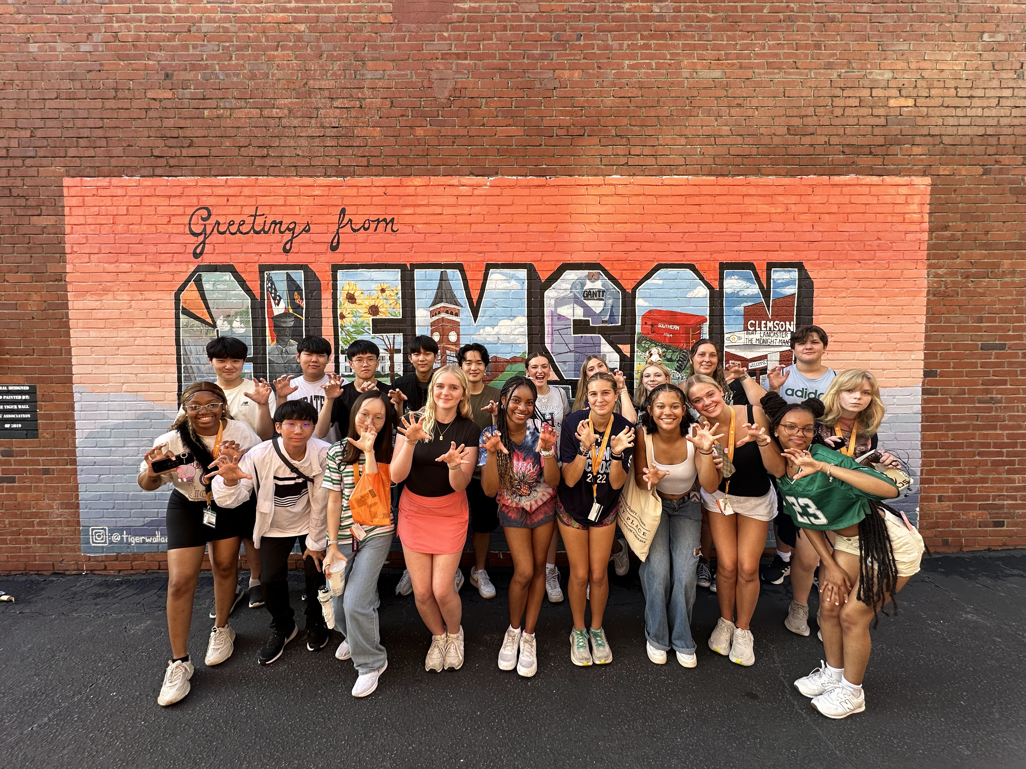 Campers in front of a Clemson Tiger Mural