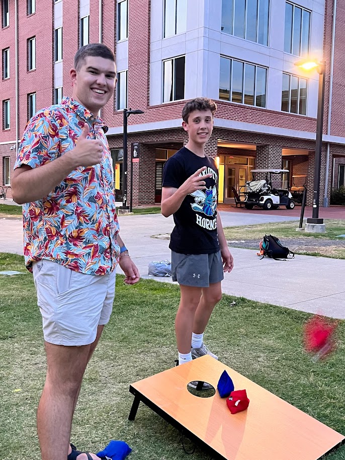 Students giving a thumbs up